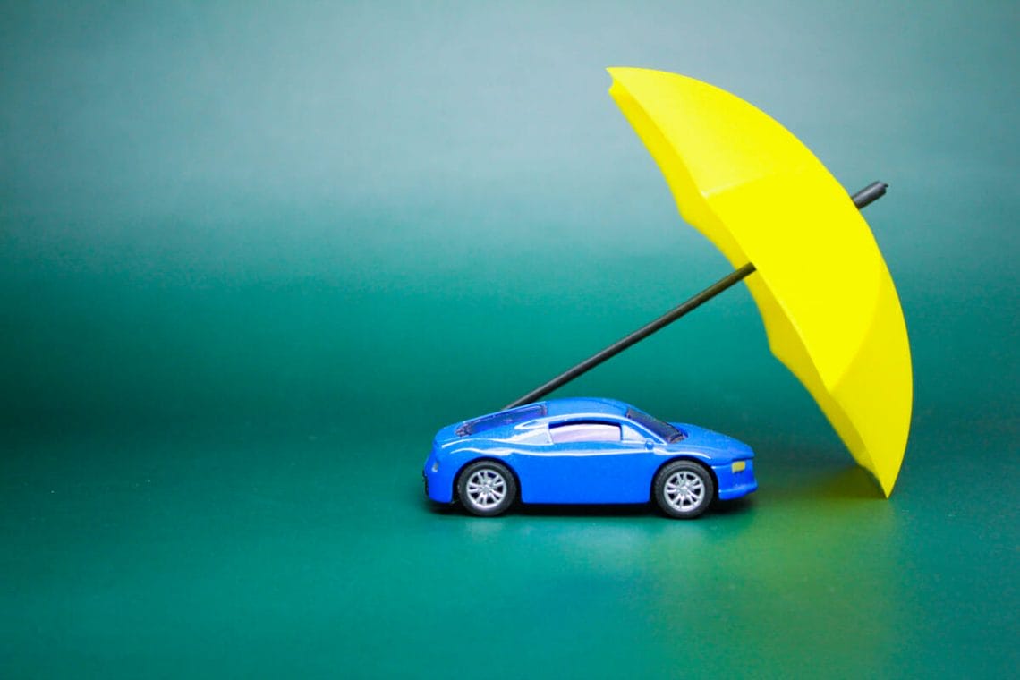 small car model covered by an umbrella vehicle in 2023 01 06 22 27 01 utc
