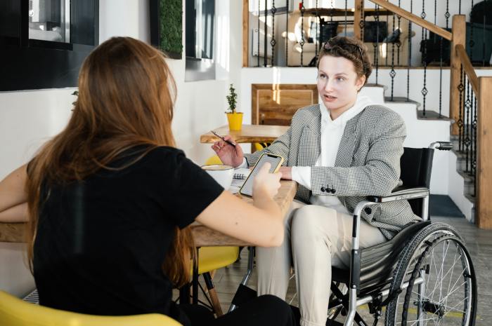 disabled people disabilities work workers disability working adults program discrimination woman successful rights wheelchair office ticket research interviews tips person